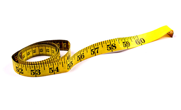 Tape Measure on White Background. Dieting Concept - High Quality Free ...